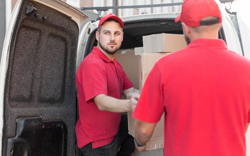 front-view-delivery-man-with-packagaes