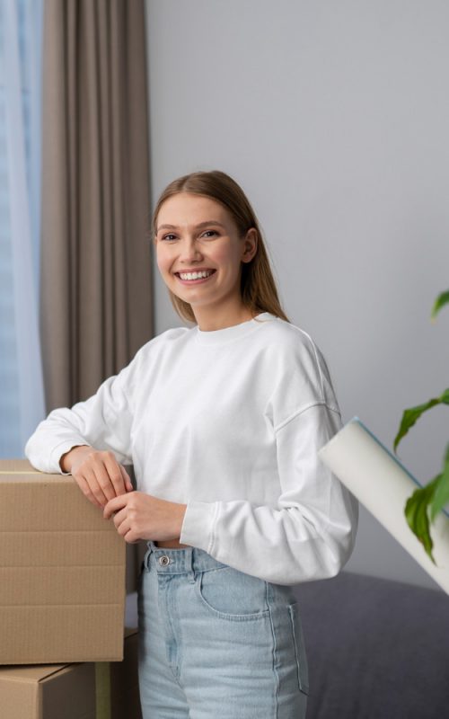 woman-posing-boxes-belongings-med