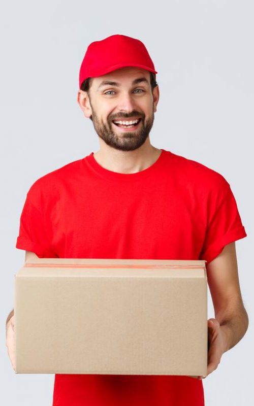 order-delivery-online-shopping-package-shipping-concept-friendly-smiling-courier-red-uniform-cap-t-shirt-handing-out-packages-customers-employee-bring-parcel-box-grey-background